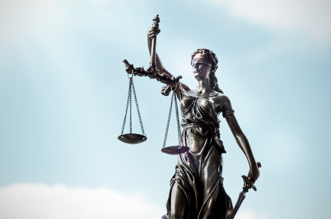 Lady Justice Against Blue Sky